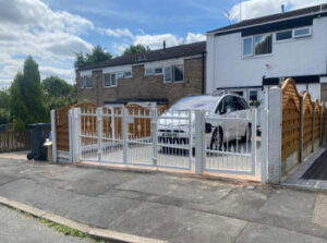 White wrought iron gates on a customers driveway