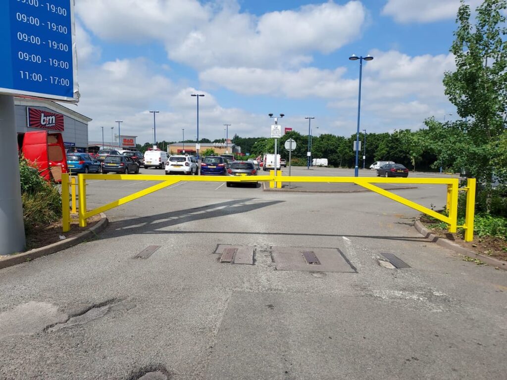 wrought iron barrier at a car park