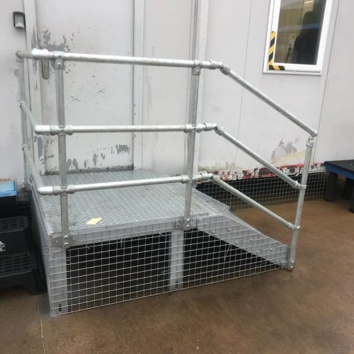 Wrought iron steps and railing at an airport